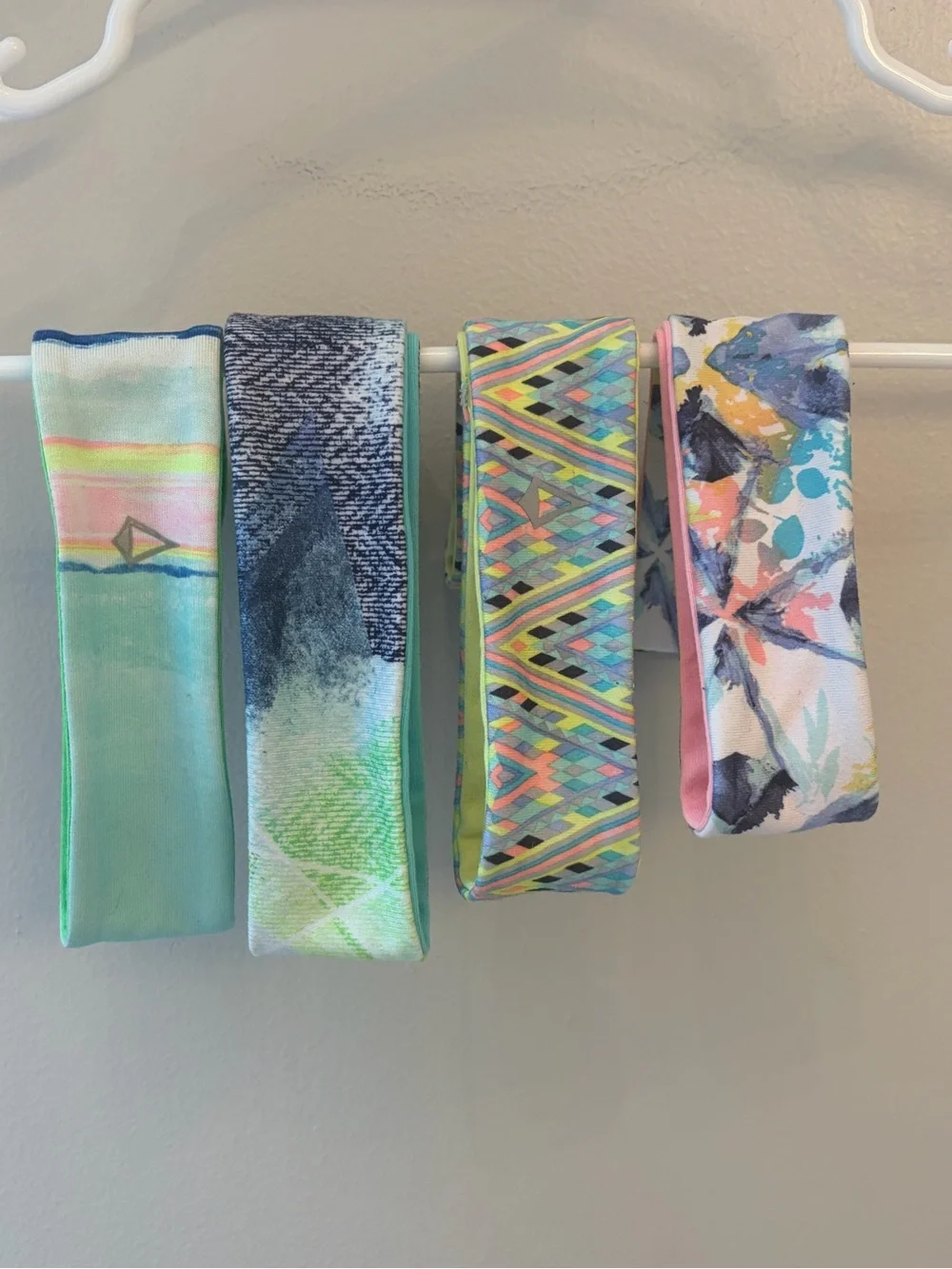 Kids Stretchy Reflective Logo Headbands - reversible Aviva set of four